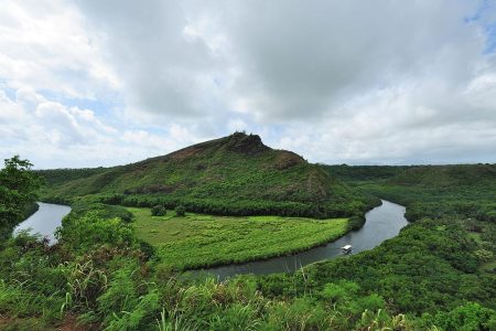 Kauai Wailua River bend with boat going upstream