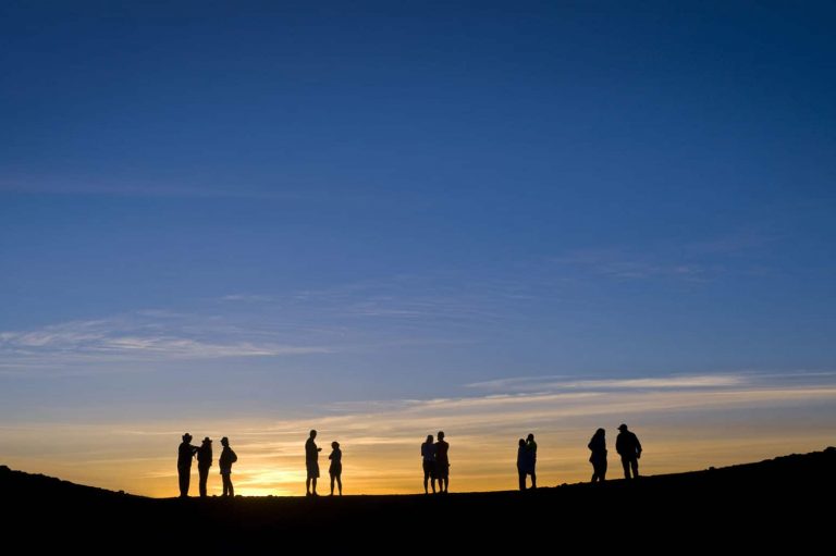 silhouette People at haleakala sunrise