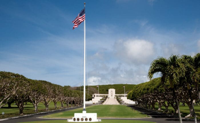 center of punchbowl national cemetery with us flag at full mast