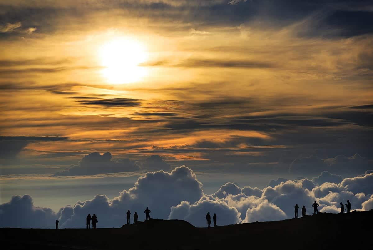 Haleakala Sunset with people silhouetted in foreground